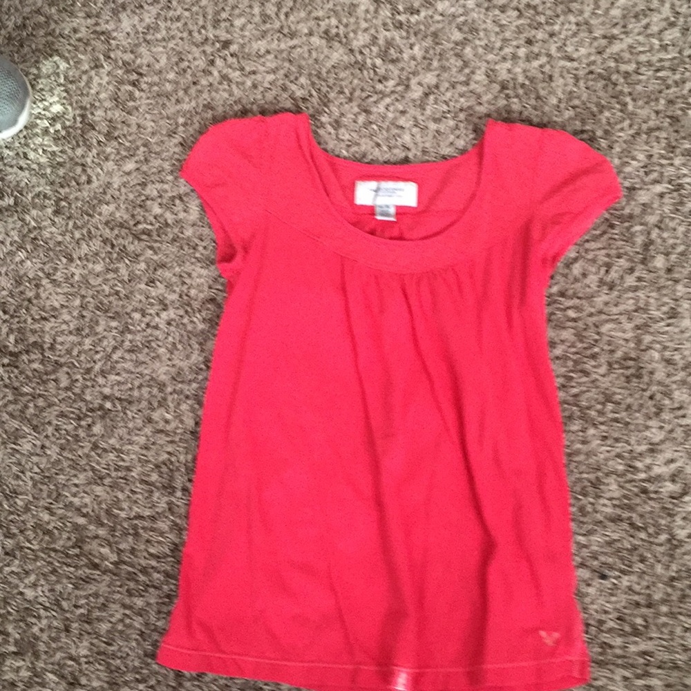 A peach blouse from American eagle